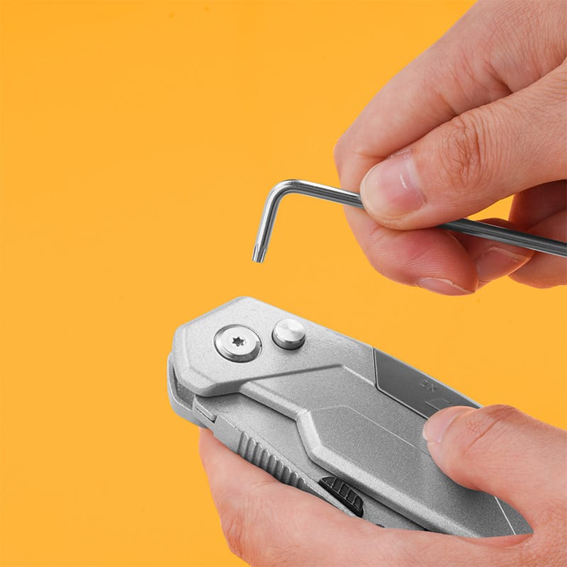 Close-up of Hand using a Tolsen extra-long arm Torx hex key from the 9pcs set to work on a device