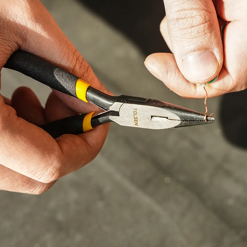 Close-up of hand using Tolsen 4.5 inch mini long nose pliers to bend thin copper wire