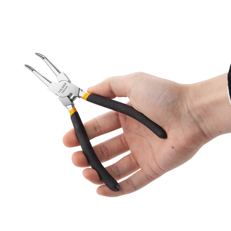 Close-up of hand holding Tolsen 7 inch internal bent circlip pliers