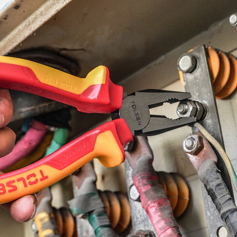 Using the Insulated Pliers from the Tolsen 15Pcs Insulated Hand Tool Set to tighten nuts