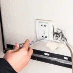 Using voltage tester from Tolsen 15Pcs Insulated Hand Tools Set on electrical outlet