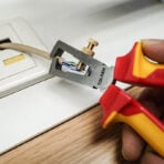 Using wire stripping pliers from Tolsen 15Pcs Insulated Hand Tools Set to strip cable