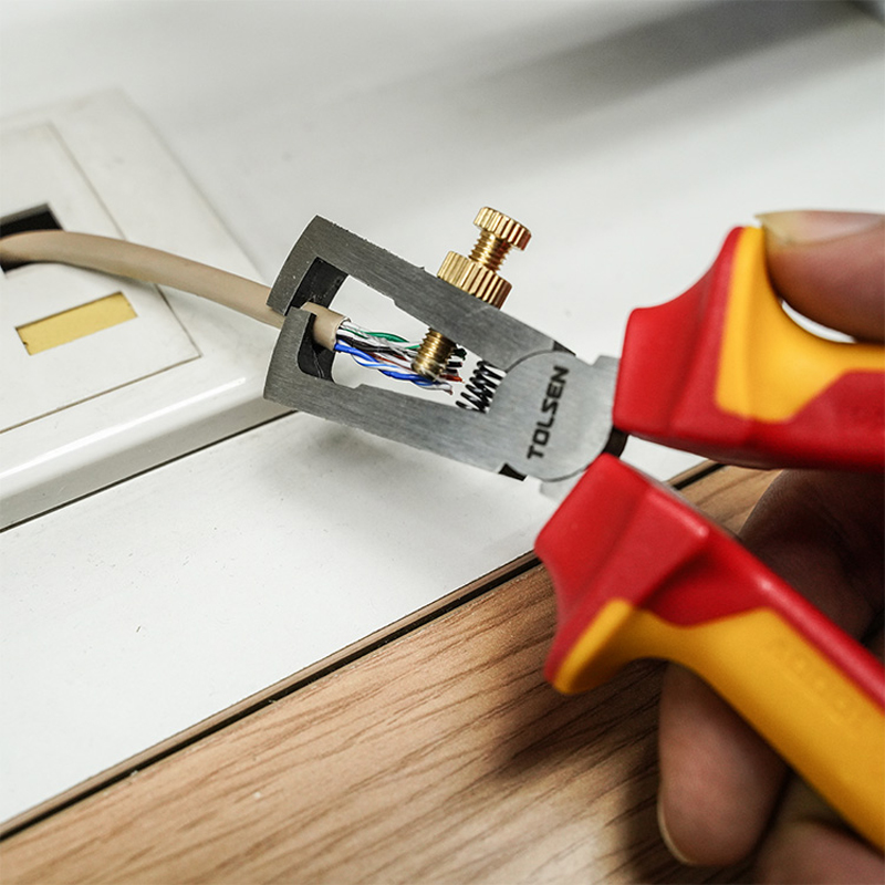 Using wire stripping pliers from Tolsen 15Pcs Insulated Hand Tools Set to strip cable