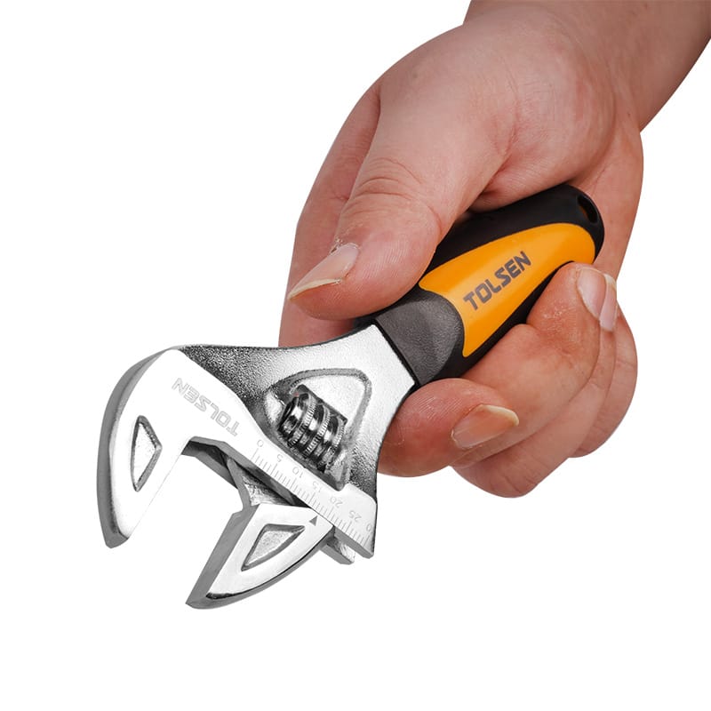 Close-up of a hand holding a Tolsen 6.5-inch stubby adjustable wrench