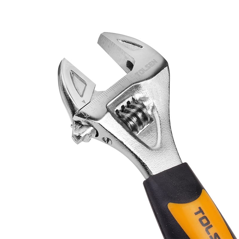 Close-up of the Tolsen 6.5-inch stubby adjustable wrench, showing the wide-opening jaw and chrome-finished head with measurement scale