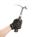 Hand in a work glove holding a Tolsen one-piece forged roofing hammer