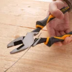 Close-up of Tolsen high leverage lineman's pliers side cutting wire