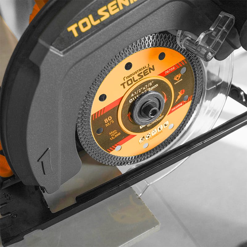 Close-up of Tolsen Ultrathin Diamond Disc cutting tile with Tolsen circular saw