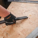 Using Tolsen 1200W 30L Wet and Dry Vacuum Cleaner to cleaning up small items from wood surface