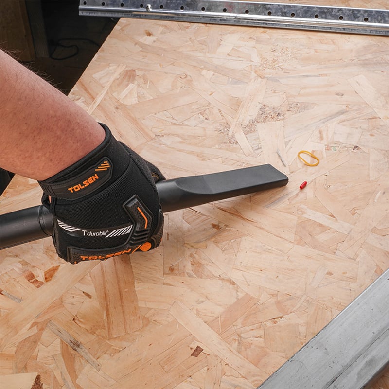 Using Tolsen 1200W 30L Wet and Dry Vacuum Cleaner to cleaning up small items from wood surface
