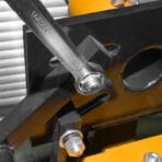Tolsen 19mm combination spanner from the 5pcs set tightening a bolt on metal structure
