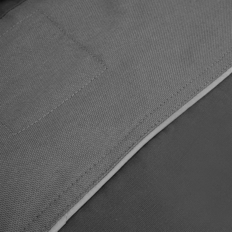 Close-up of TOLSEN Working Jacket fabric showing coarse weave, diagonal seam, and reinforced stitching