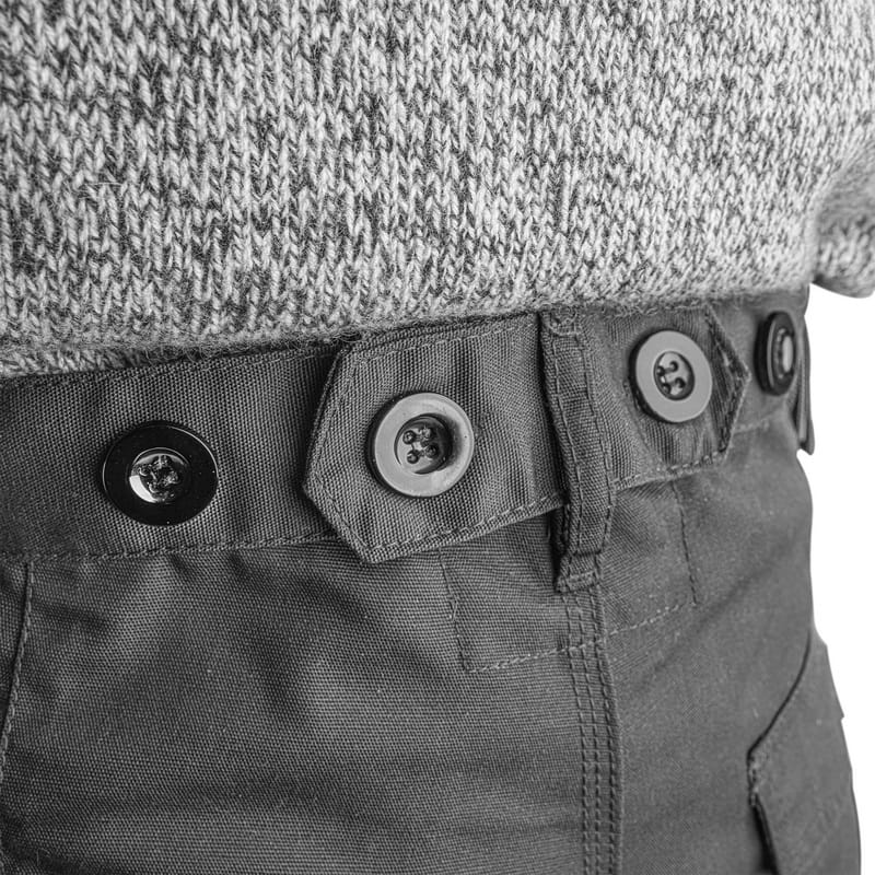 Detail of the internal adjustable elastic waistband with buttons allowing for a custom fit on Tolsen trousers.