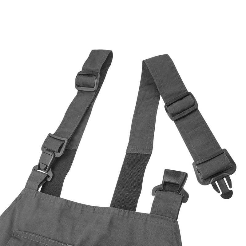 Close-up of the adjustable elastic shoulder straps and durable plastic buckles on Tolsen bib overalls.