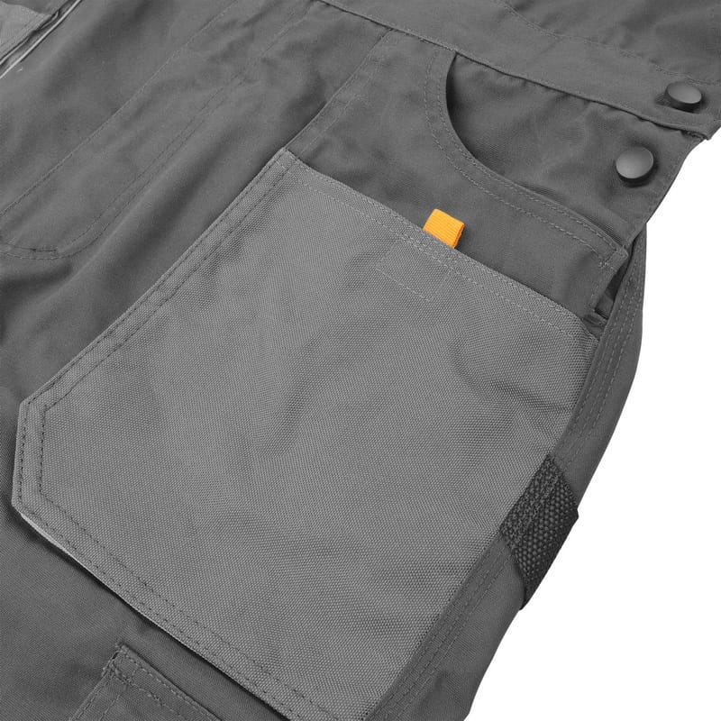 Close-up of the abrasion-resistant knee pad pockets on Tolsen working overalls designed for knee protection inserts.