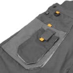 Detail of the side cargo pocket with a D-ring attachment point for tools on Tolsen industrial overalls.