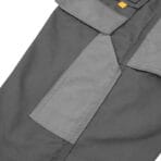 Close-up of the reinforced grey knee pad pockets on Tolsen working trousers designed for heavy-duty protection.