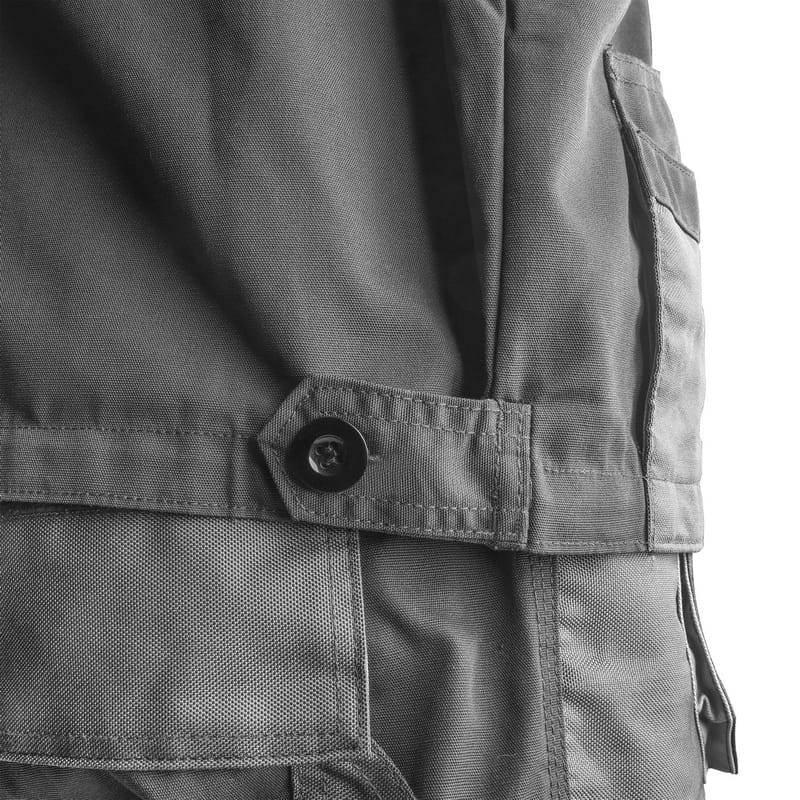 Adjustable button tab at the waist hem of the Tolsen work jacket for a custom fit.