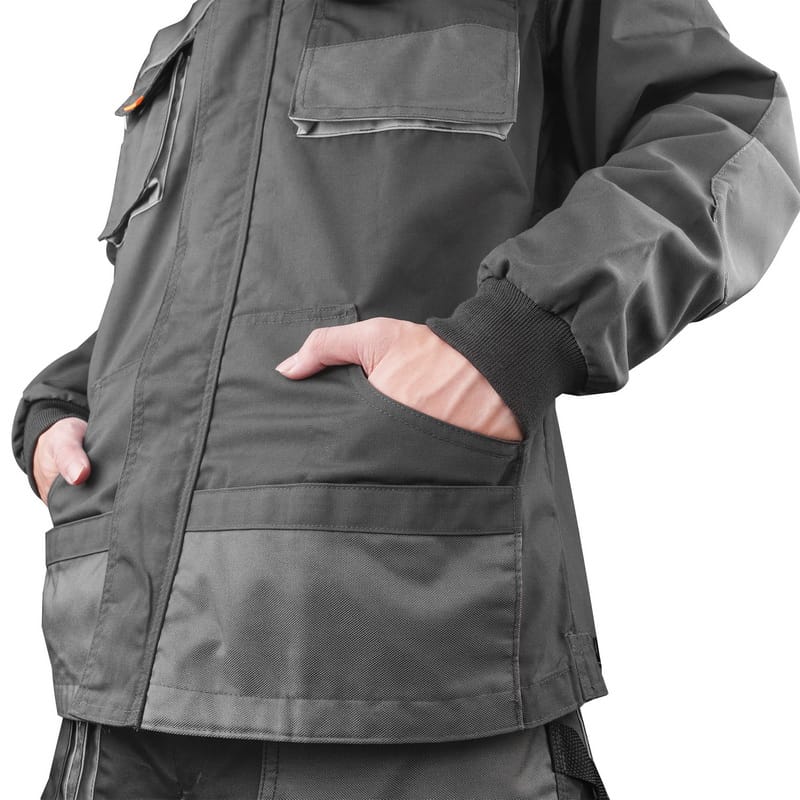Model demonstrating the comfortable side hand-warmer pockets on the Tolsen working jacket.