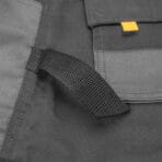 Side fabric hammer loop detail on Tolsen workwear pants for convenient tool storage.