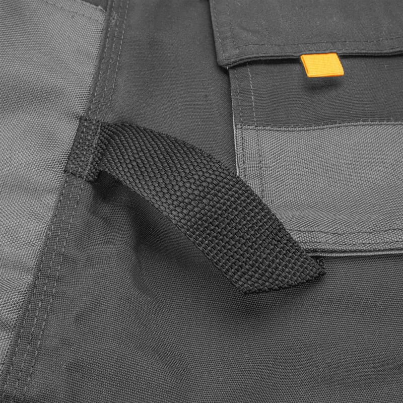 Side fabric hammer loop detail on Tolsen workwear pants for convenient tool storage.