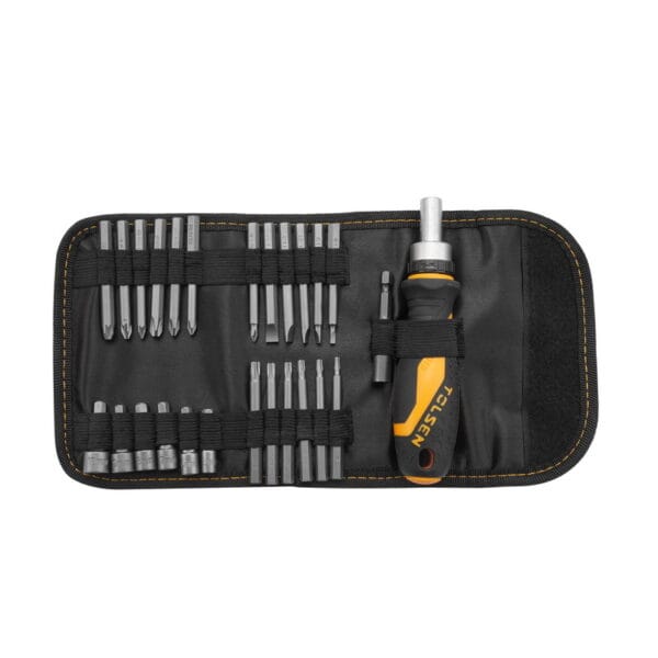 Open textile pouch displaying organized Tolsen ratchet screwdriver, extension bar, bits, and sockets