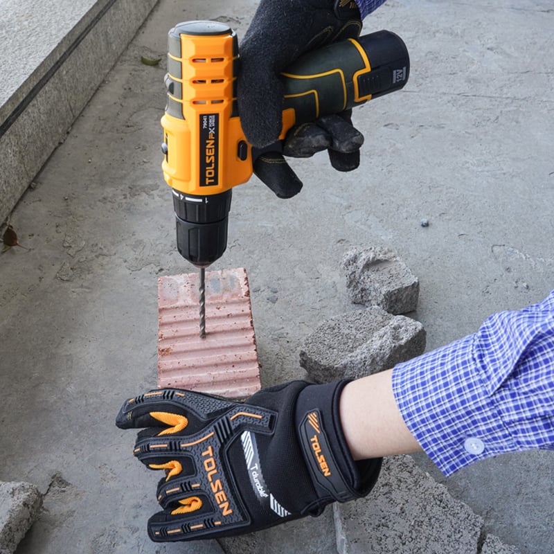 Tolsen 12V Cordless Drill drilling into brick