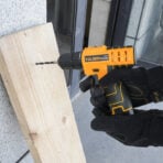Tolsen 12V Cordless Drill drilling into wood