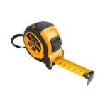 Tolsen 5m Industrial measuring tape highlighting the extended yellow metric blade and ergonomic black rubber grip.