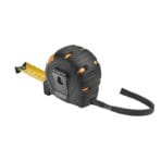 Back angled view of Tolsen measuring tape focusing on the sturdy metal belt clip and anti-slip rubberized texture.