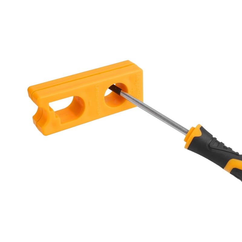 Inserting a Tolsen precision screwdriver tip into the magnetizer block to increase magnetic hold on screws.