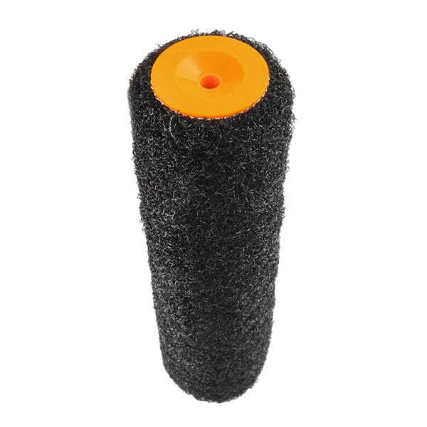 Close-up end view of Tolsen black nylon roller sleeve showing coarse texture and orange core.