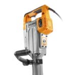 Rear close-up of TOLSEN 1600w demolition hammer highlighting motor housing, caution label, and secondary grip