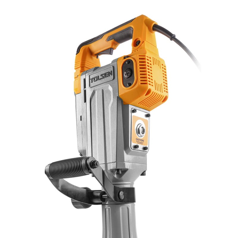 Rear close-up of TOLSEN 1600w demolition hammer highlighting motor housing, caution label, and secondary grip