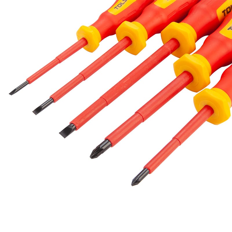 Close-up detail of Tolsen insulated screwdriver shafts and hardened Cr-V steel magnetic black tips.