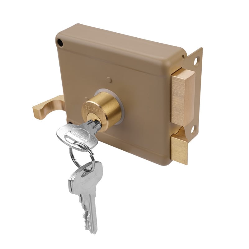 Tolsen rim lock with key inserted, showing the solid brass deadbolt and latch mechanism in operation.