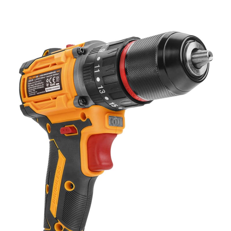 Close-up angled view of the TOLSEN 20V brushless hammer drill, focusing on the heavy-duty 1/2-inch keyless metal chuck, adjustable torque ring, and built-in LED work light above the trigger.