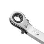 Close-up detail of the TOLSEN ratchet spanner's 12-point box end, highlighting the ratcheting mechanism and the easy-to-use reversing thumb lever.