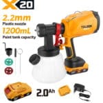 Complete TOLSEN 20V cordless paint sprayer kit featuring a 1200mL tank and 2.2mm nozzle, displayed with one 2.0Ah lithium-ion battery, a standard charger, and cleaning accessories.